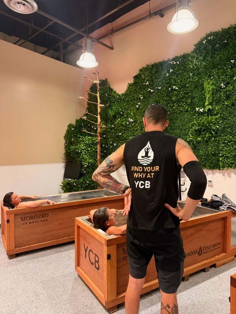 YCB coach guiding members through their ice baths