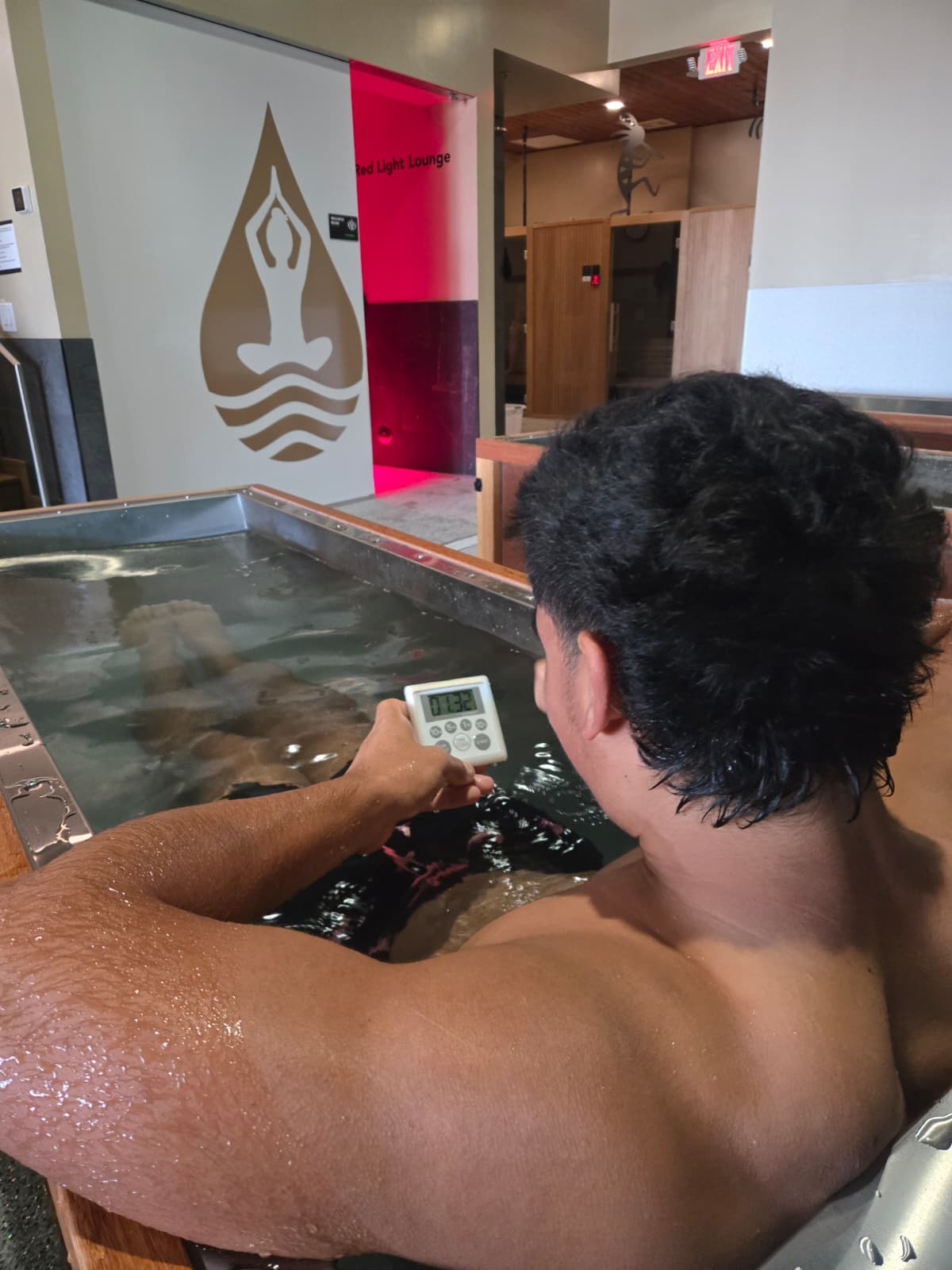 Member timing his plunge in a Morozko ice bath