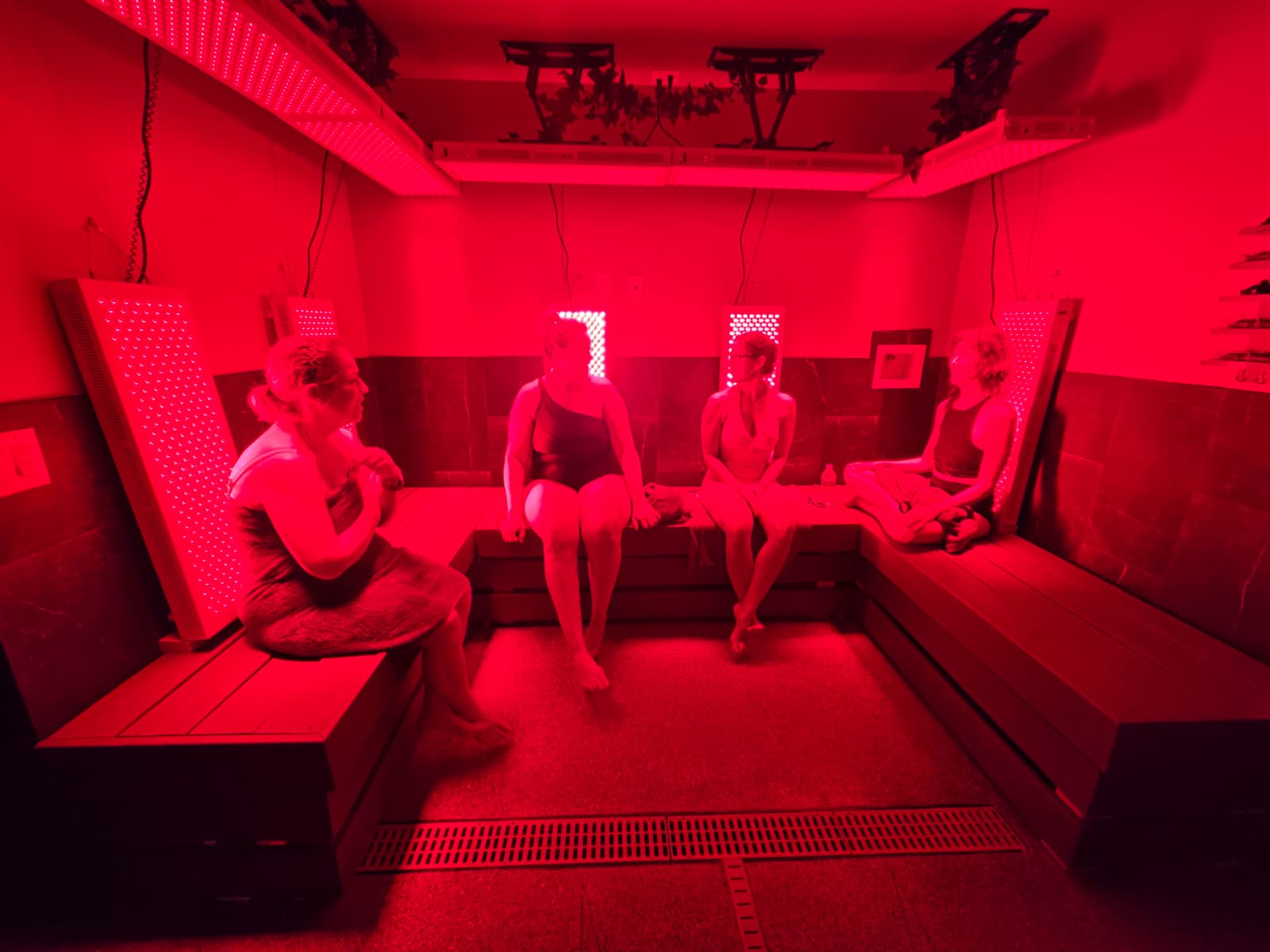 Women relaxing together in the Red Light Lounge